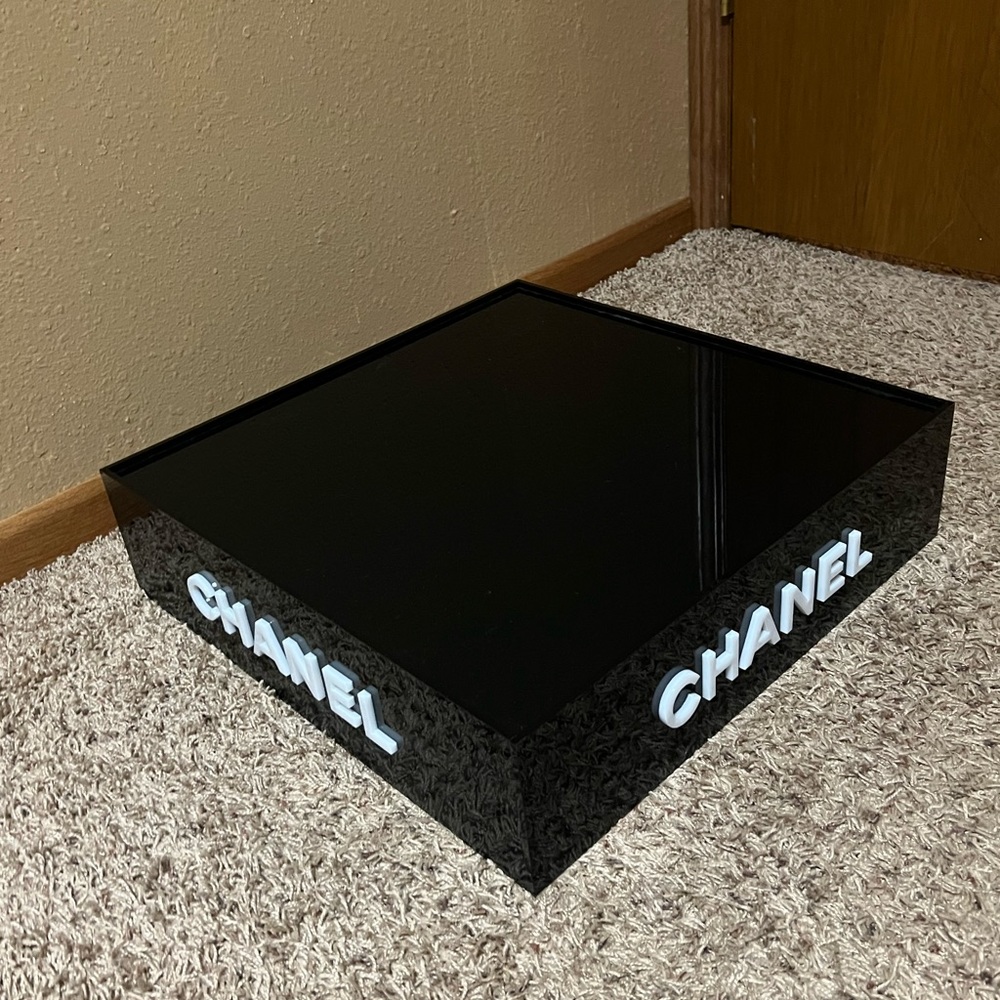 So cute! Acrylic Chanel display box from Nordstrom.